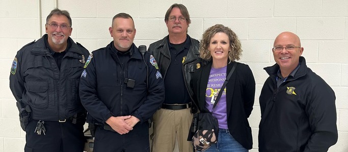 OMS Principal with Local Law Enforcement and State Police coordinating a presentation on social media safety.